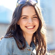 Woman with attractive smile on a summer day